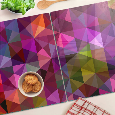 Glazen snijplanken Geometrische vormen in roze en paarse tinten.