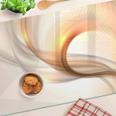 Snijplanken van glas Lichtgolven in goudtinten