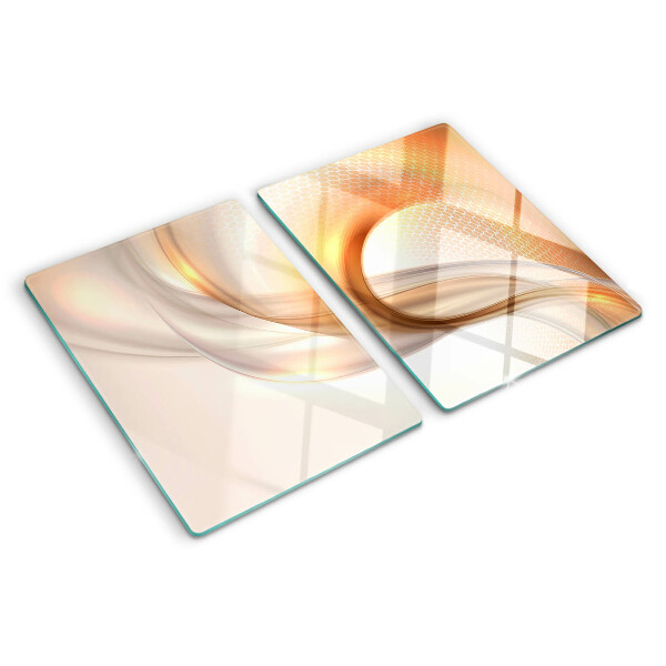 Snijplanken van glas Lichtgolven in goudtinten