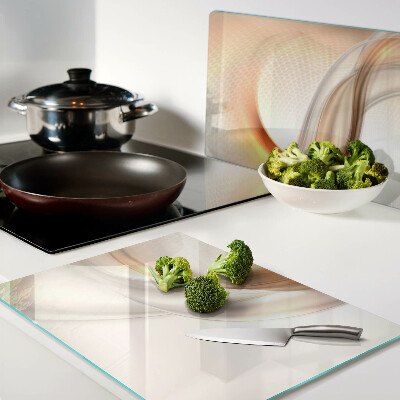 Snijplanken van glas Lichtgolven in goudtinten