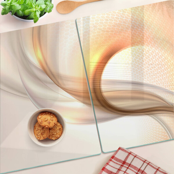 Snijplanken van glas Lichtgolven in goudtinten