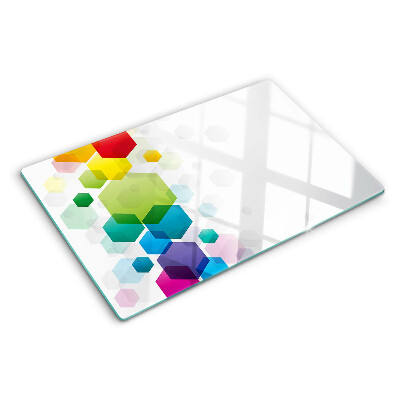 Snijplanken van glas Kleurrijke zeshoeken op de achtergrond