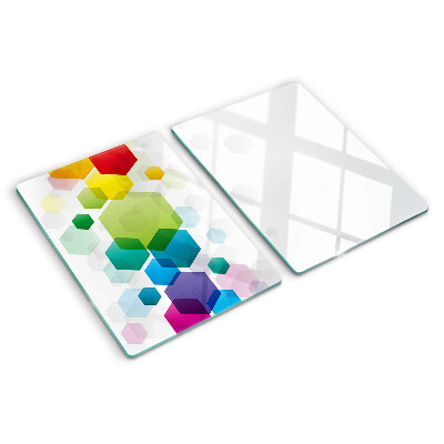 Snijplanken van glas Kleurrijke zeshoeken op de achtergrond