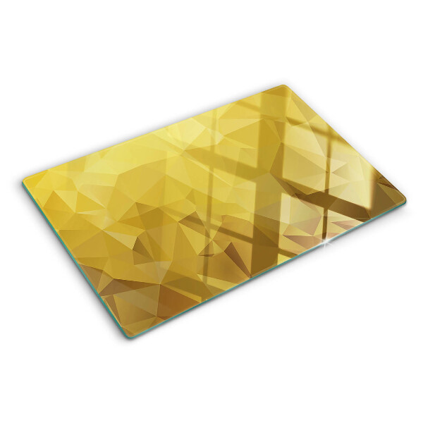 Snijplanken van glas Geometrische vormen in goudtinten