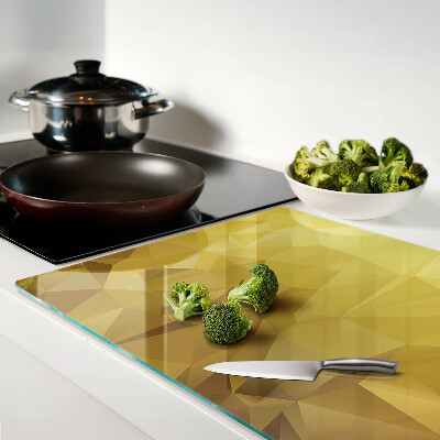 Snijplanken van glas Geometrische vormen in goudtinten