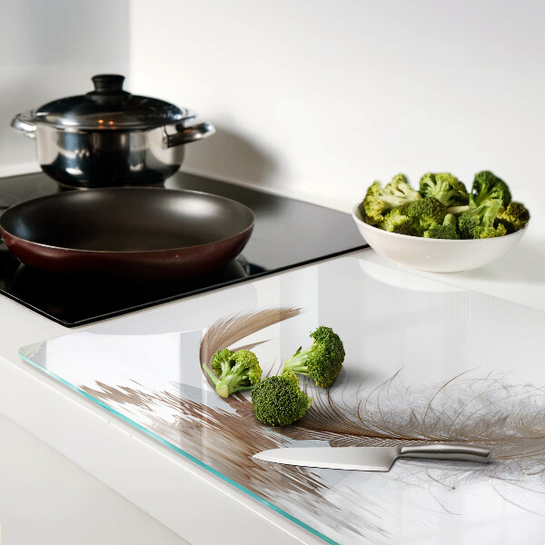 Glazen snijplanken Een veer tegen het water