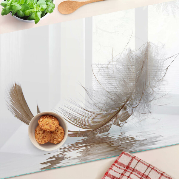 Glazen snijplanken Een veer tegen het water