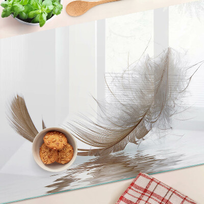 Glazen snijplanken Een veer tegen het water