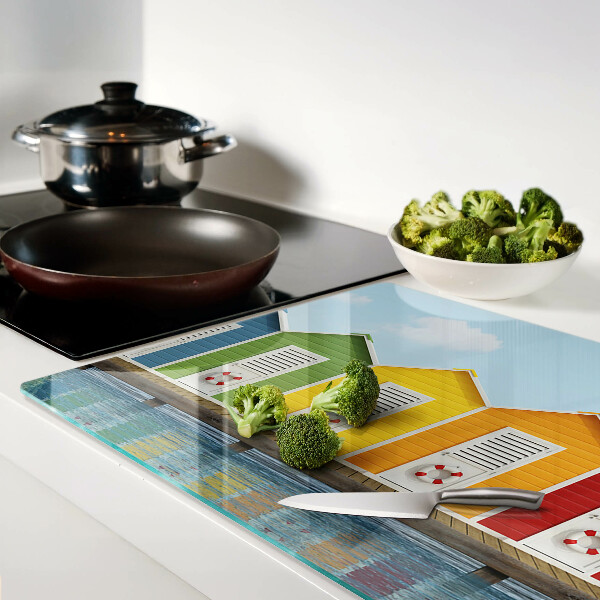 Snijplanken van glas Kleurrijke huizen aan zee