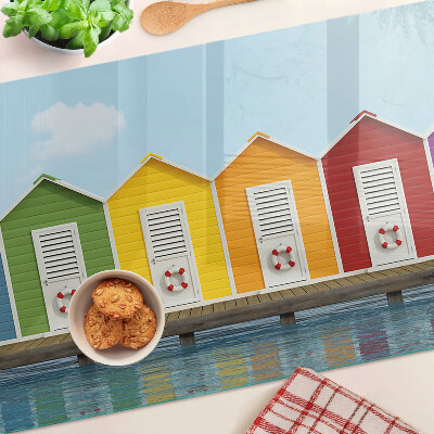 Snijplanken van glas Kleurrijke huizen aan zee