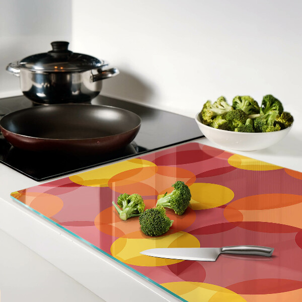 Glazen snijplanken Kleurrijke cirkels in warme tinten.