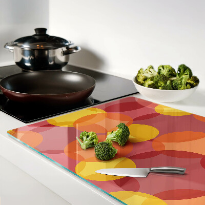 Glazen snijplanken Kleurrijke cirkels in warme tinten.