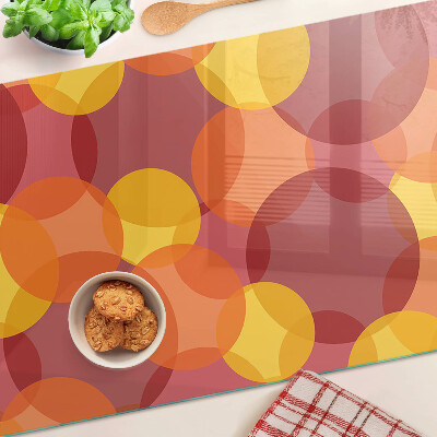 Glazen snijplanken Kleurrijke cirkels in warme tinten.