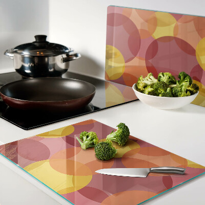 Glazen snijplanken Kleurrijke cirkels in warme tinten.