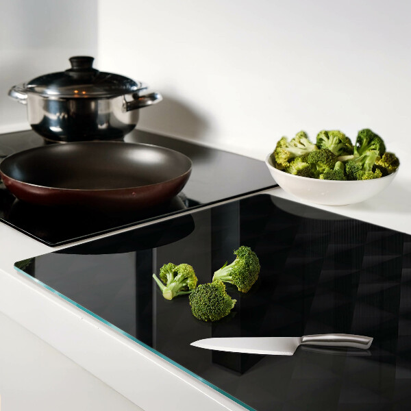 Glazen snijplanken Geometrische patronen in verschillende tinten zwart.