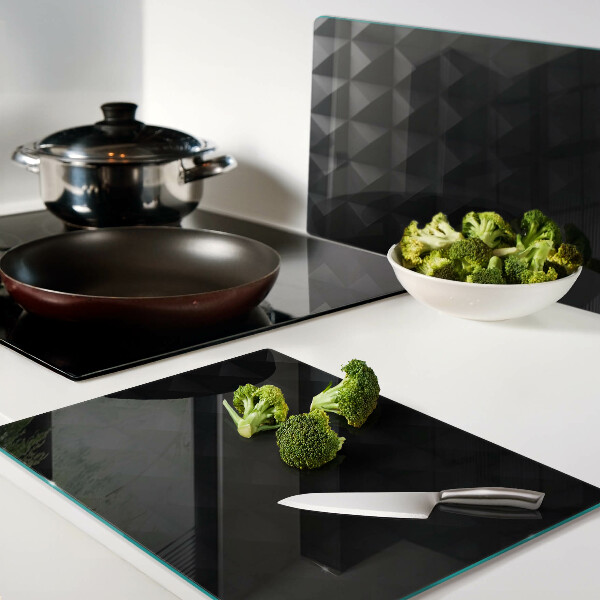 Glazen snijplanken Geometrische patronen in verschillende tinten zwart.