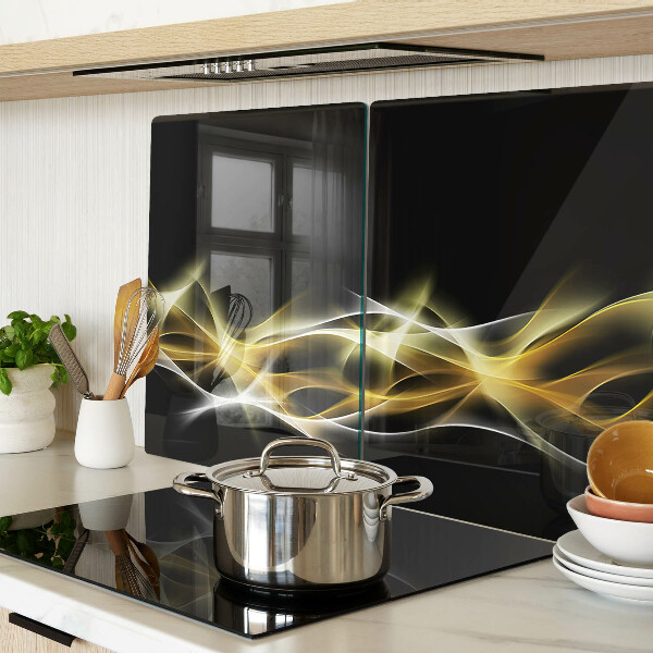 Snijplanken van glas Een golf van licht in gouden tinten