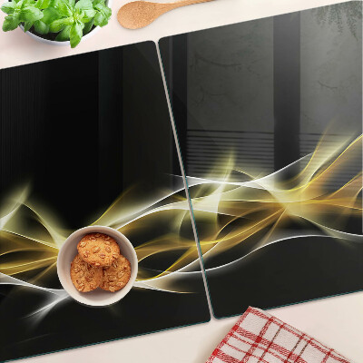 Snijplanken van glas Een golf van licht in gouden tinten