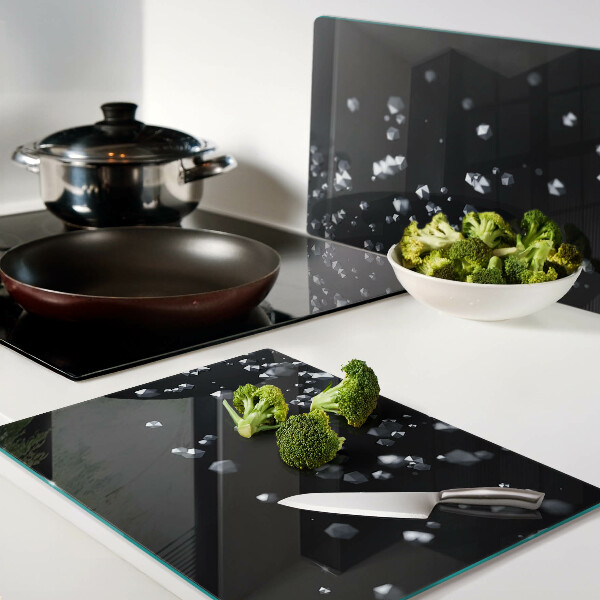 Snijplanken glas Kristallen bubbels op een zwarte achtergrond