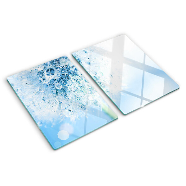 Snijplanken van glas Paardenbloem met waterdruppels