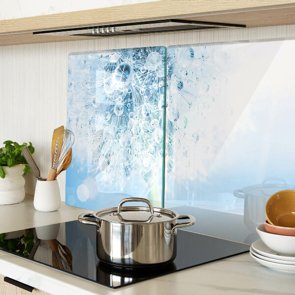 Snijplanken van glas Paardenbloem met waterdruppels