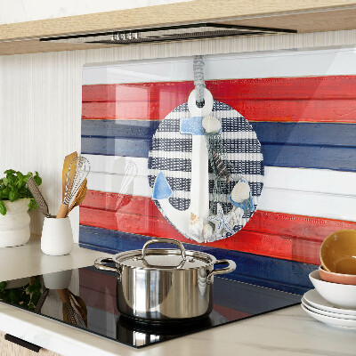 Snijplanken van glas Anker tegen een achtergrond van strepen