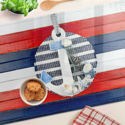 Snijplanken van glas Anker tegen een achtergrond van strepen