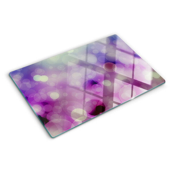 Snijplanken van glas Bokeh in paarse en roze tinten.