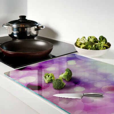 Snijplanken van glas Bokeh in paarse en roze tinten.