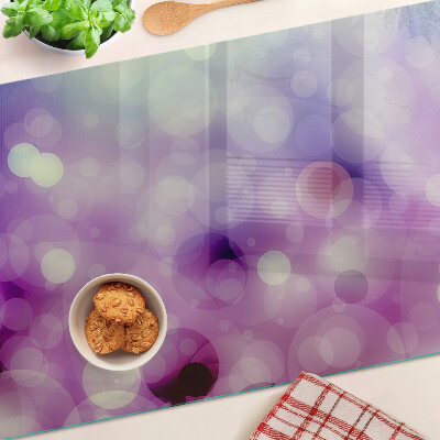 Snijplanken van glas Bokeh in paarse en roze tinten.