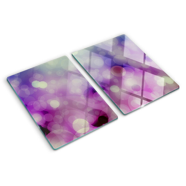 Snijplanken van glas Bokeh in paarse en roze tinten.