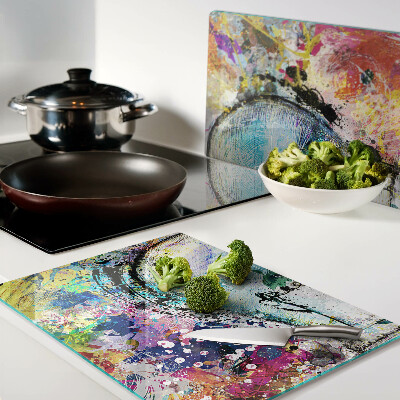 Snijplanken glas Gloeilamp op een gekleurde achtergrond