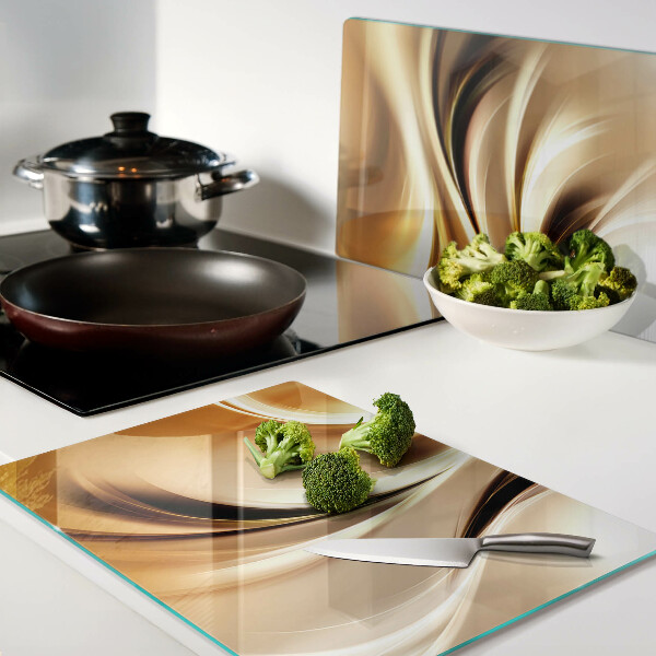 Snijplanken van glas Abstracte golven in goudtinten