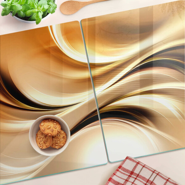 Snijplanken van glas Abstracte golven in goudtinten