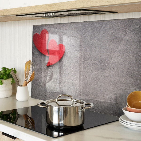 Snijplanken glas Een hart tegen de achtergrond van een raam.