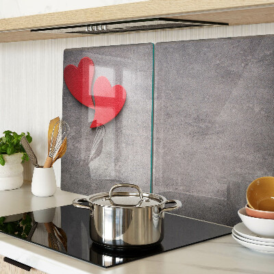 Snijplanken glas Een hart tegen de achtergrond van een raam.