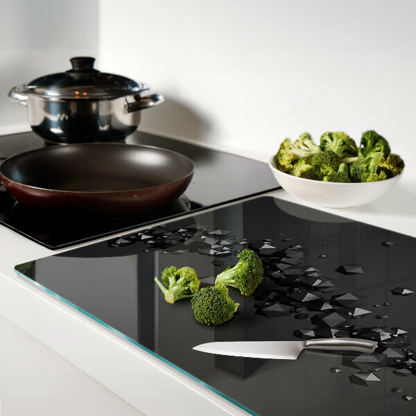 Glazen snijplanken Zwarte kristallen op de achtergrond