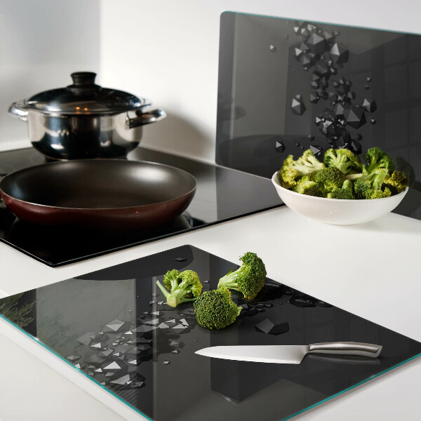 Glazen snijplanken Zwarte kristallen op de achtergrond