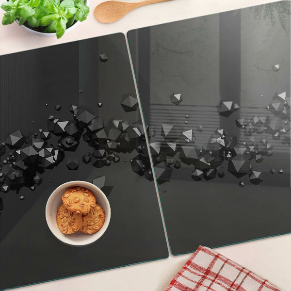 Glazen snijplanken Zwarte kristallen op de achtergrond