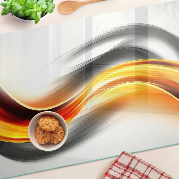 Snijplanken van glas Golven in oranje en zwart
