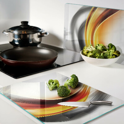 Snijplanken van glas Golven in oranje en zwart