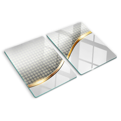 Glazen snijplanken Een gouden golf op een achtergrond van stippen.