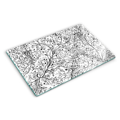 Snijplanken van glas Een plantenpatroon met delicate takken.