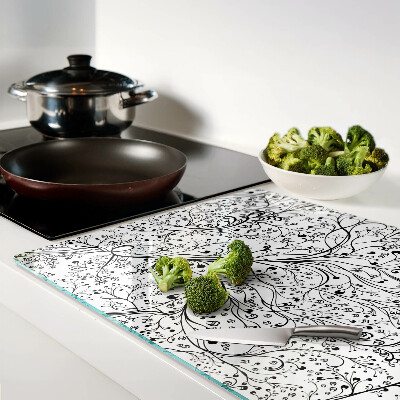 Snijplanken van glas Een plantenpatroon met delicate takken.