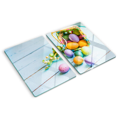 Glazen snijplanken Paaseieren in verschillende kleuren in een mandje