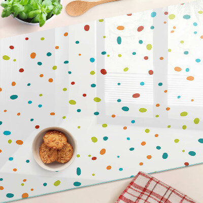 Snijplanken van glas Kleurrijke stippen op een witte achtergrond