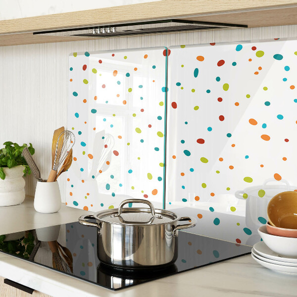 Snijplanken van glas Kleurrijke stippen op een witte achtergrond