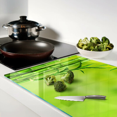 Glazen snijplanken Bamboe op een groene achtergrond