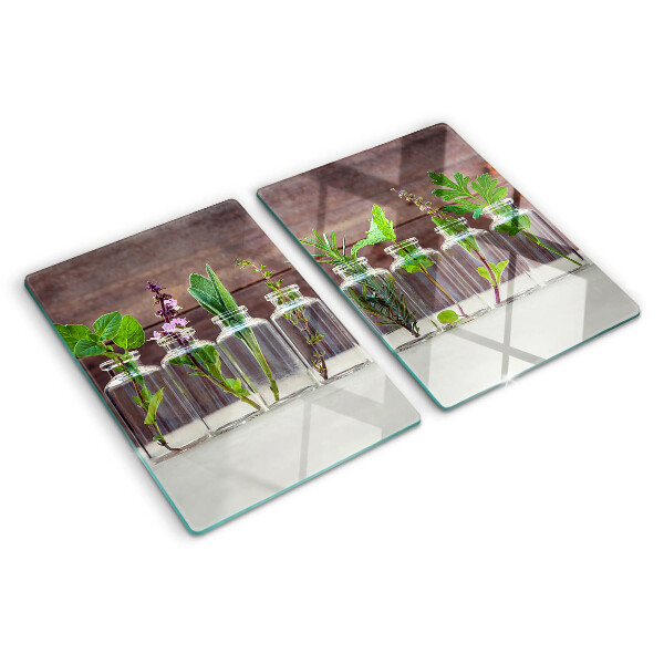 Snijplanken van glas Planten in flessen