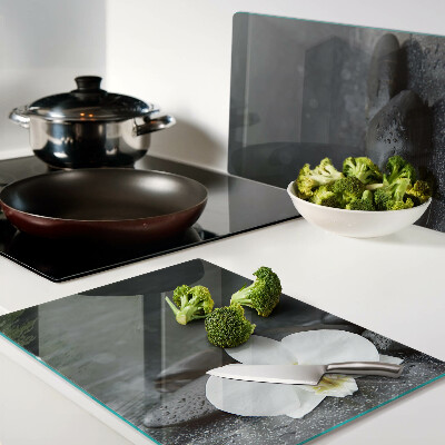 Snijplanken glas Orchideebloem op stenen